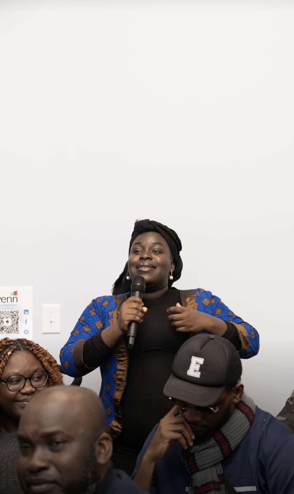 A participant asks a question into the microphone